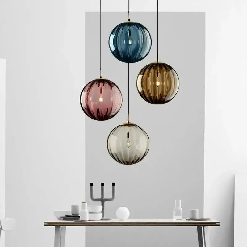 Set of four ribbed colorful glass ball pendant lights in blue rose gold amber and frosted clear for living room decorbites pendant lamp