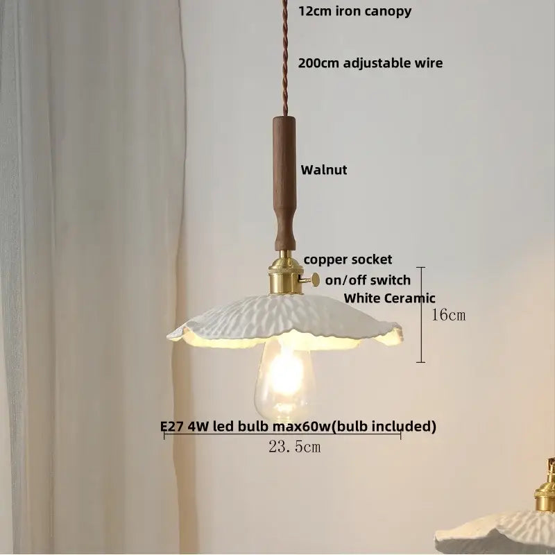 A delicate white ceramic led pendant lamp with fluted design and warm e27 led glow for dining room decorbites ceramic led
