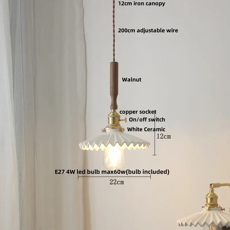 Vintage-style pendant lamp with walnut canopy, brass socket, and scalloped white ceramic shade for dining room decorbites ceramic led