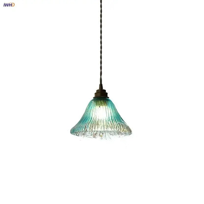 Teal blue glass led pendant light with ribbed texture and twisted metal chain for dining room decorbites blue glass design