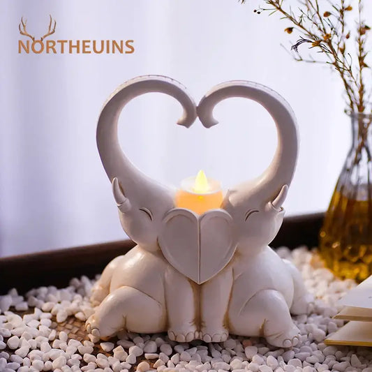 White resin decorbites elephant couple candlestick with heart-shaped design and led candle for romantic living room decor