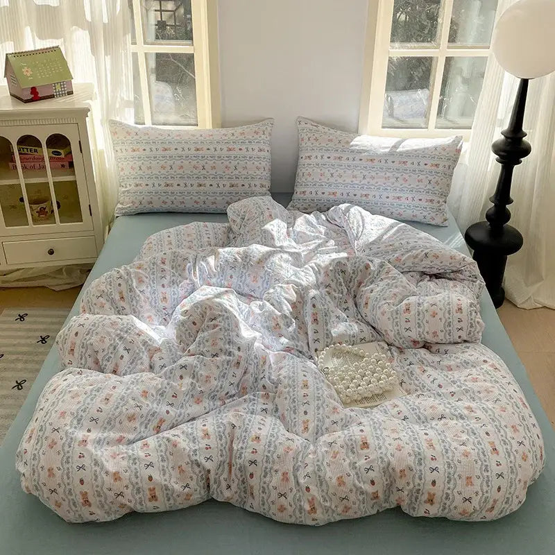 Romantic pink cotton flower print bedding set featuring a cozy light blue and white floral decorbites cotton flower duvet