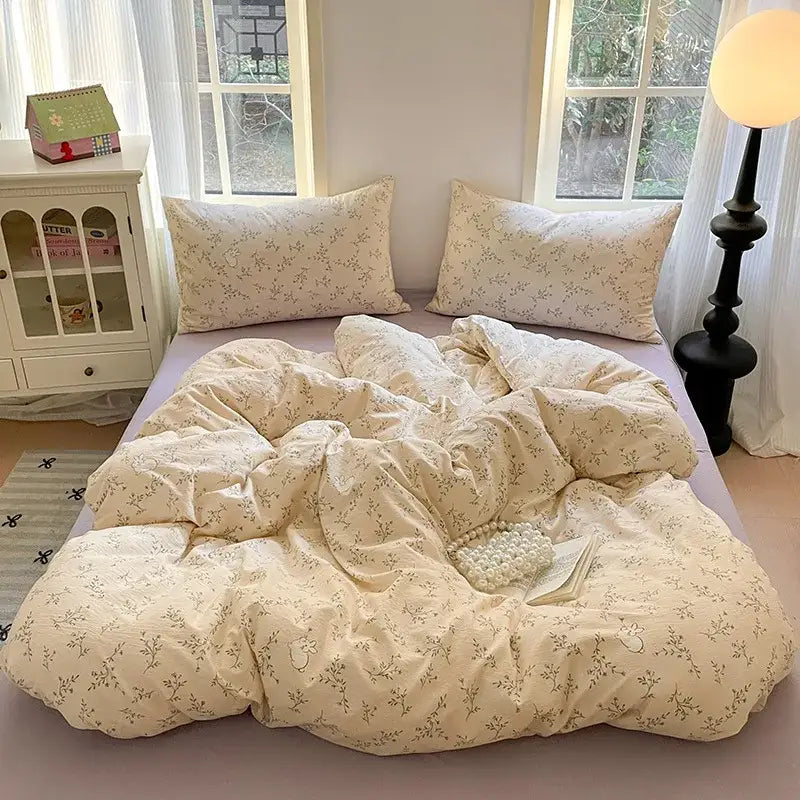 Cream-colored cotton flower print bedding set with soft cozy texture and matching pillows for bedroom decorbites cotton flower