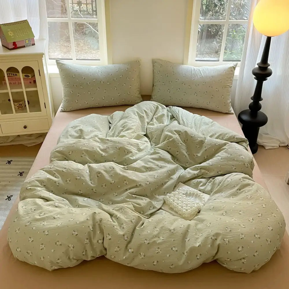 Soft mint green bedding set with cotton flower print and textured fabric finish from decorbites cotton flower collection