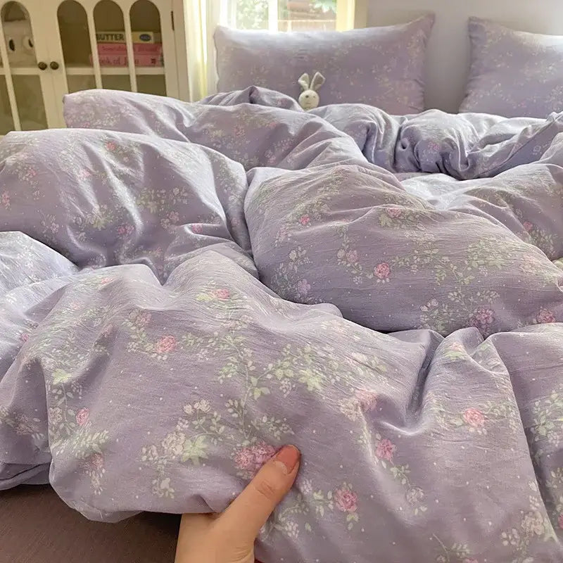 Romantic pink cotton flower print bedding set featuring a soft lavender cotton flower print duvet cover with floral decorbites pattern