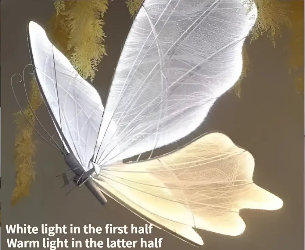 Translucent white butterfly floor lamp with delicate veined wings glowing warmly for decorbites butterfly wedding decoration