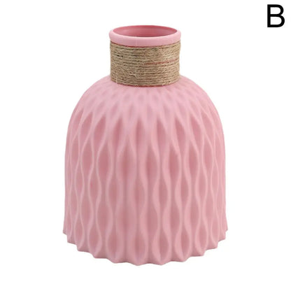 Pink ceramic rope plastic vase with textured wavy pattern and twine-wrapped neck for living room decoration