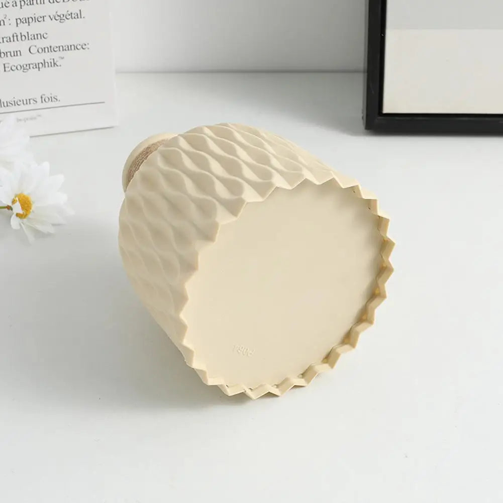 Beige ceramic rope plastic vase with textured geometric pattern and scalloped base for living room decoration