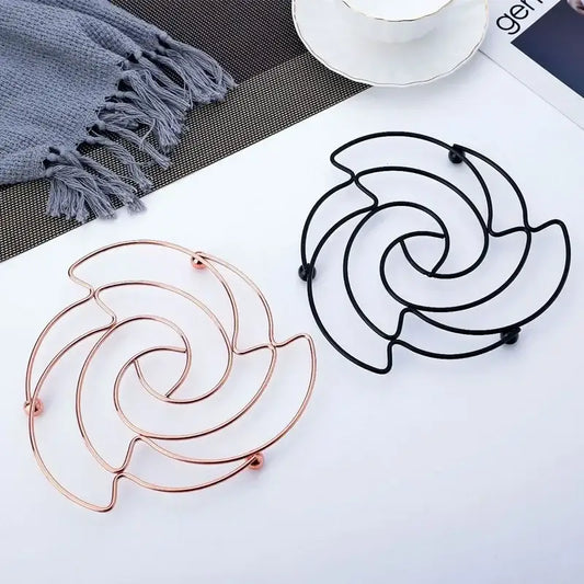 Rose flower iron pan pot mat available in black and rose gold colors for decorbites iron pan kitchen use