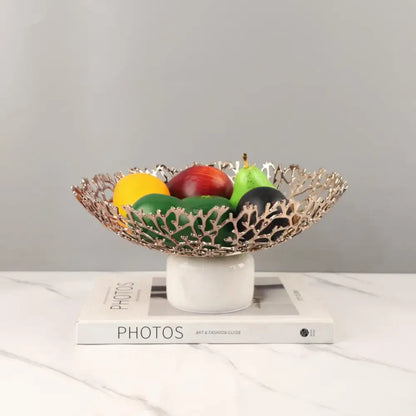 Rose gold coral disc pedestal marble fruit bowl with intricate leaf lace pattern and white ceramic base decorbites coral disc