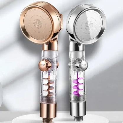 Two modern high pressure shower heads in rose gold and chrome with transparent bodies and internal spiral filters