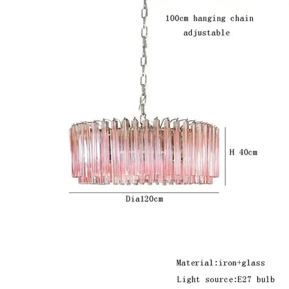 A modern rose gold pink glass chandelier with iron and glass construction and metallic chain suspension for kitchens