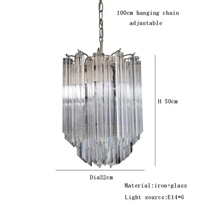A rose gold pink glass chandelier with clear glass tubes cascading in a kitchen pendant light design