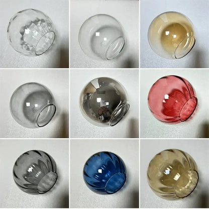 Clear, amber, red, gray, blue, and brown decorbites glass ball pendant lamp shades with smooth rounded design for living room decor