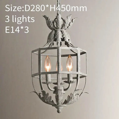 Antique-style grey gold metal cage chandelier with ornate leafy detailing and three exposed filament bulbs for kitchen decorbites grey gold