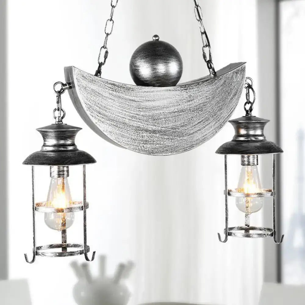 Decorbites rustic caged shade island lamp features aged silver crescent moon pendant with antique brass lanterns and clear glass