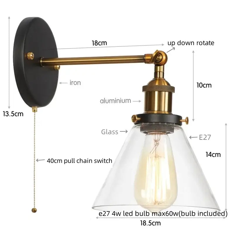 Rustic antique copper clear glass wall sconce with black iron backplate brass arm and decorbites clear glass shade plug in light