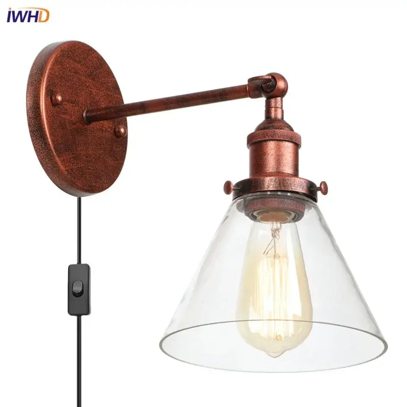 Rustic antique copper wall sconce with clear glass conical shade and exposed Edison bulb for bedroom decorbites clear glass