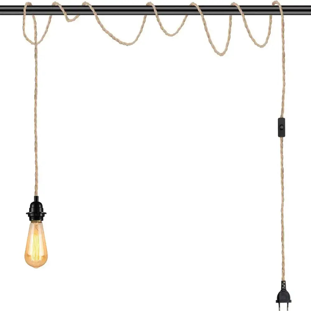 Rustic beige and black hemp rope pendant light cord with black metal fixture and exposed edison-style bulb for living room