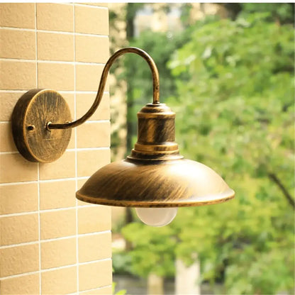 Antique brass light fixture with curved arm and domed shade, ideal as decorbites black rustic gooseneck wall sconce