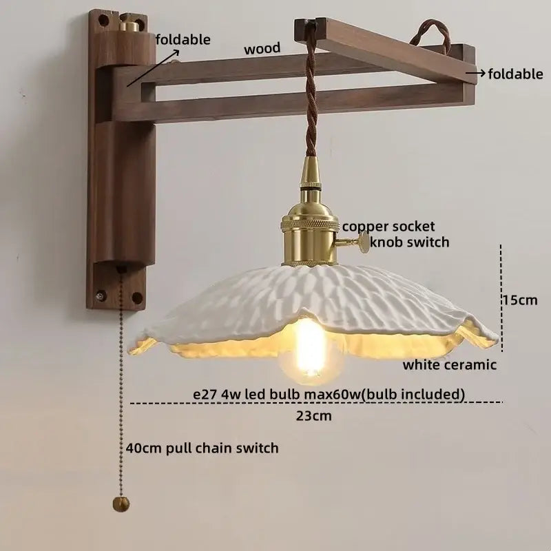 Rustic brass wall sconce with a white ceramic petal lampshade on a foldable wooden bracket by decorbites clear glass