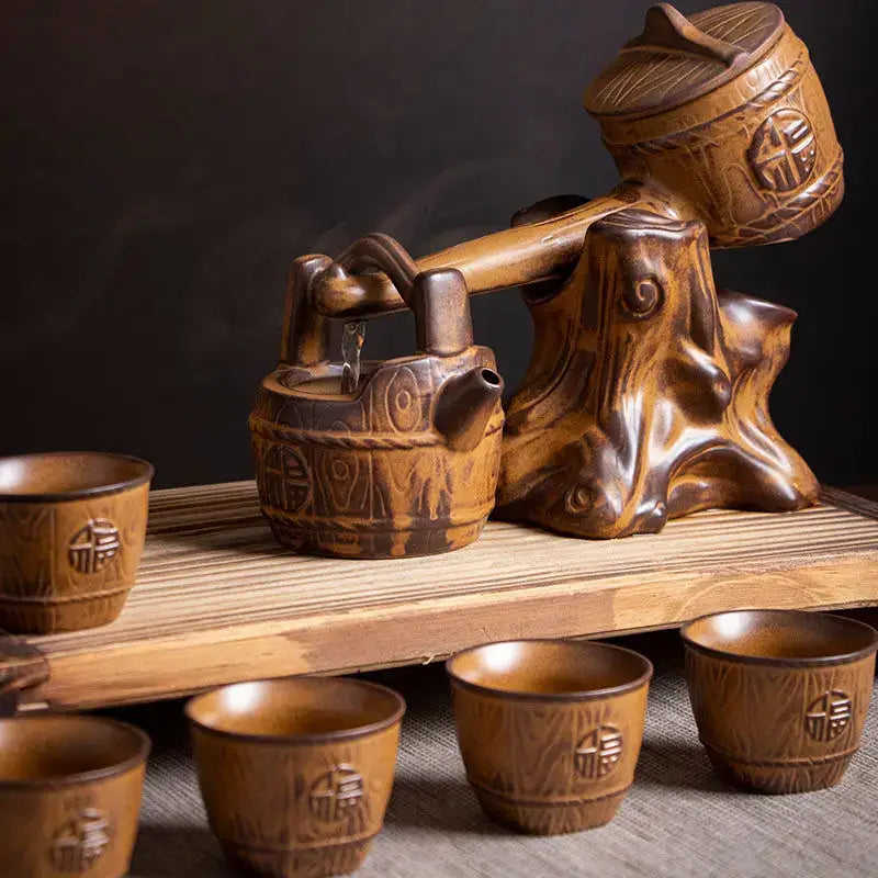 Rustic brown ceramic tea set featuring hand-carved wooden tree-root base for tea brewing decorbites ceramic kung