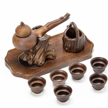 Rustic brown ceramic tea set with gourd-shaped teapot tree-root base matching cups and bucket on wooden tray decorbites ceramic kung