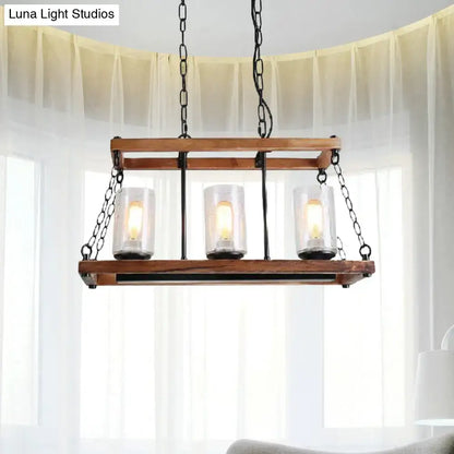 Rustic brown seeded glass island light with three 110v-120v 220v-240v candle bulbs and wooden trapezoid guard