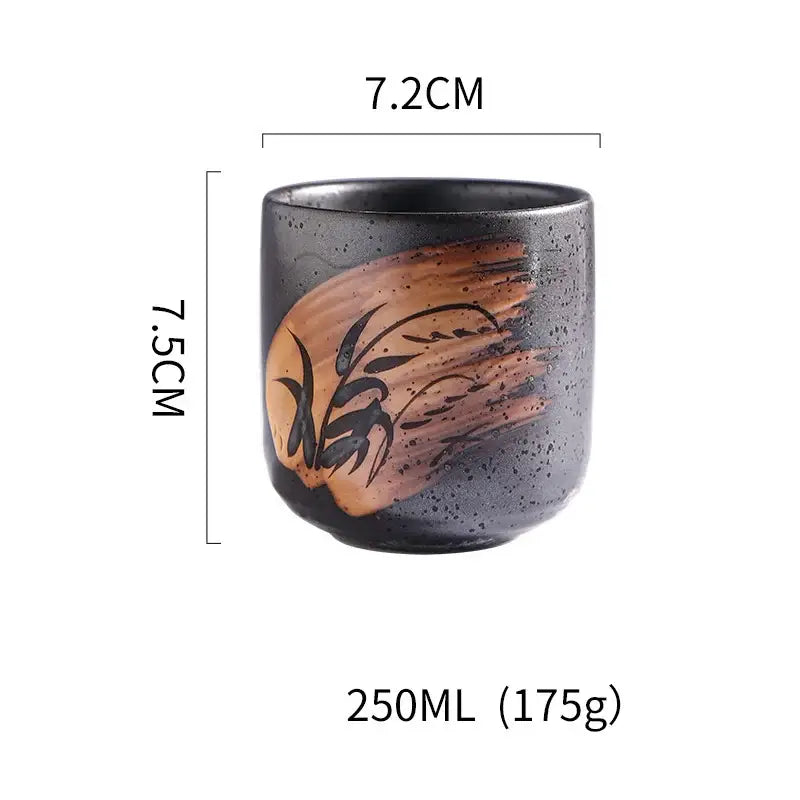 A dark speckled coarse ceramic tea cup with hand-painted copper and black floral design for decorbites coarse ceramic set