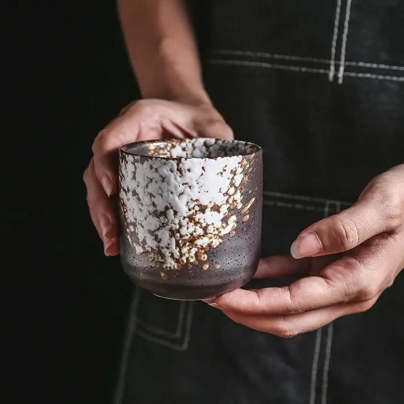 Rustic coarse ceramic tea cup with speckled gray white glaze and golden flecks ideal for dining room decorbites coarse ceramic