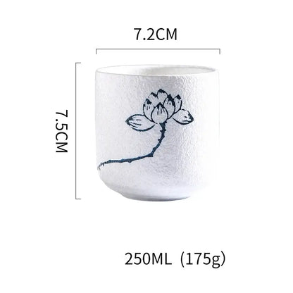 White coarse ceramic tea cup with textured surface and hand painted black lotus design from decorbites set