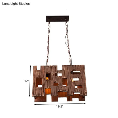 Bronze-colored rustic wooden pendant light with textured carved design and rectangular cutouts for restaurant island chandelier