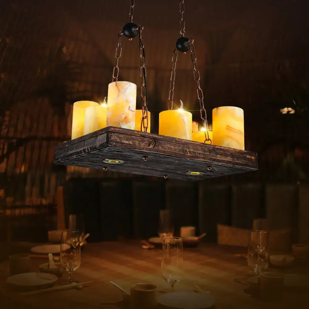 Rustic dark wood ceiling light fixture with five amber candle-like bulbs suspended by chains 220v-240v for dining room