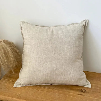 Beige decorbites linen fringed pillow cover with subtle textured weave and softly frayed edges for living room decor