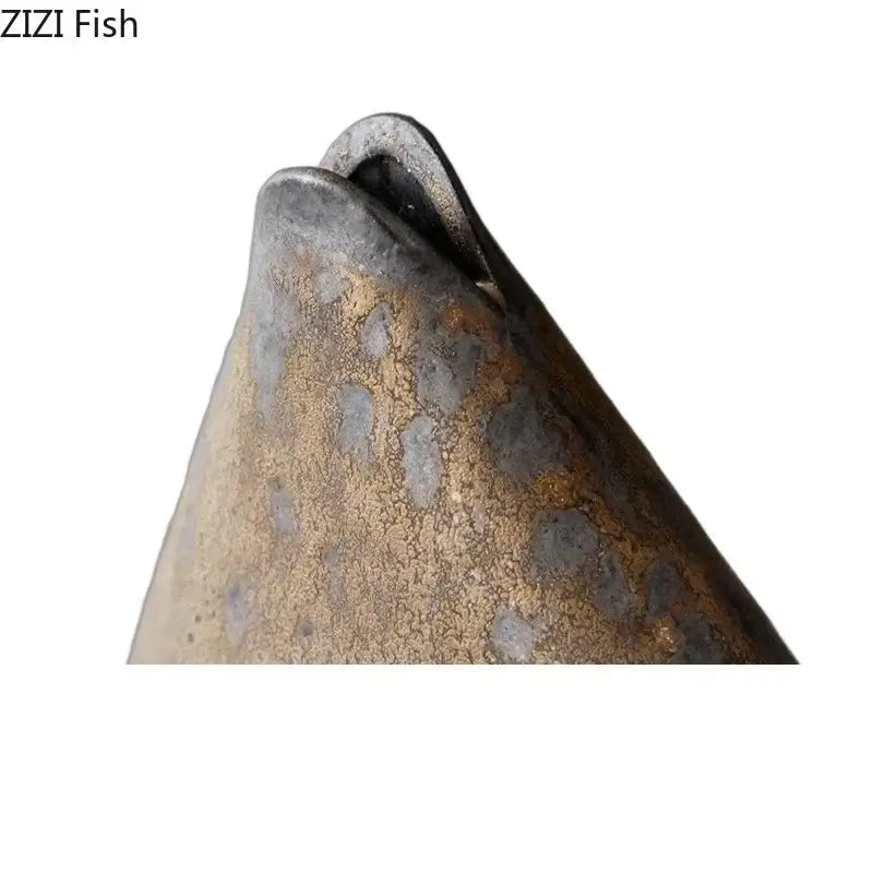 Rustic gray and brown coarse pottery vase with a textured metallic fish ornament for living room decorbites coarse pottery