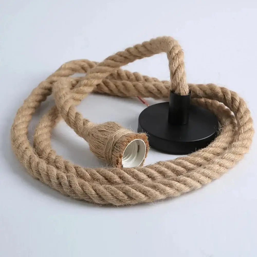 Natural fiber hemp rope pendant light with black circular base and braided texture for rustic decorative lighting