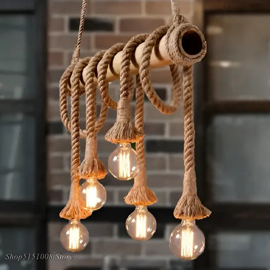 Rustic industrial bamboo pendant lights featuring exposed edison bulbs with natural rope and wooden dowels decorbites bamboo pendant