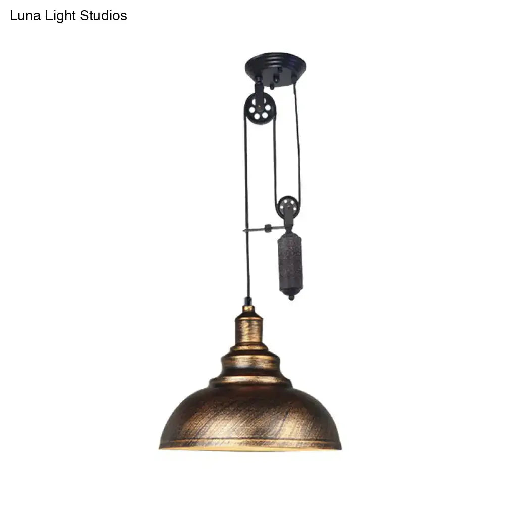 Rustic industrial dome pendant lamp with brass-finished dome shade and black metal pulley for living room lighting