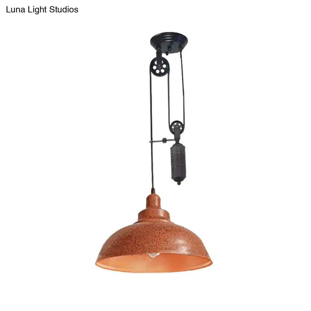 Rust-colored metal rustic industrial dome pendant lamp with black pulley for living room lighting by decorbites