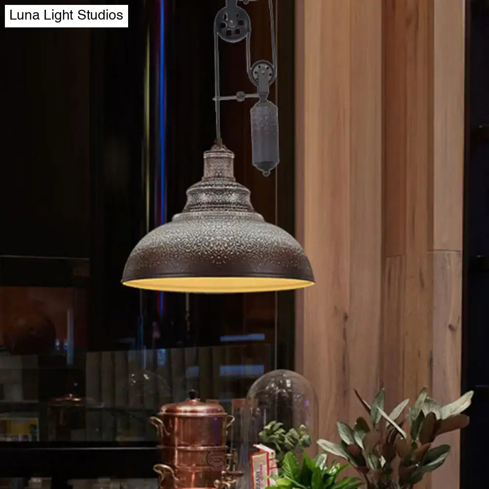 Decorbites™ rustic industrial dome pendant lamp with dark metallic finish and warm yellow interior glow for living room lighting