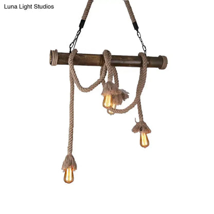 Decorbites industrial island pendant light with dark wood bamboo rod, beige rope, and exposed edison bulbs hanging lamp