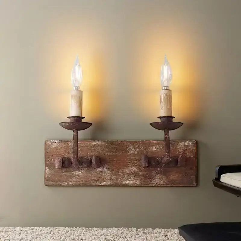 Rustic solid wood wall light with two wrought iron candle holders and frosted glass bulbs for decorbites country retro style