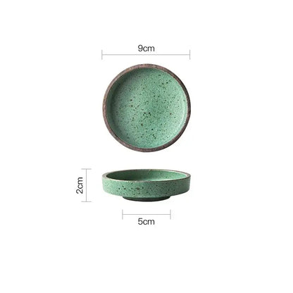 Small speckled green ceramic sauce dish with dark brown rim and shallow depth by decorbites ceramic sauce dishes