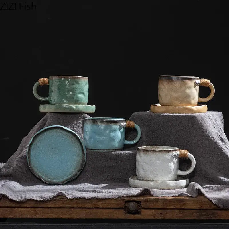 Rustic teal coarse pottery cup and saucer set with woven rope handles featuring decorbites coarse pottery glaze