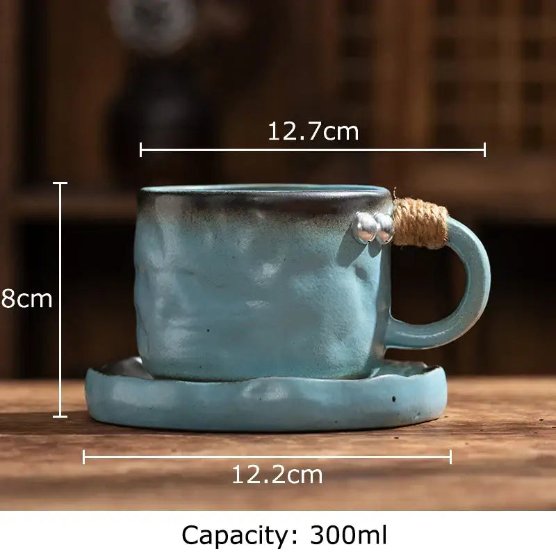 Handcrafted rustic teal coarse pottery cup with textured finish and twine-wrapped handle by decorbites coarse pottery