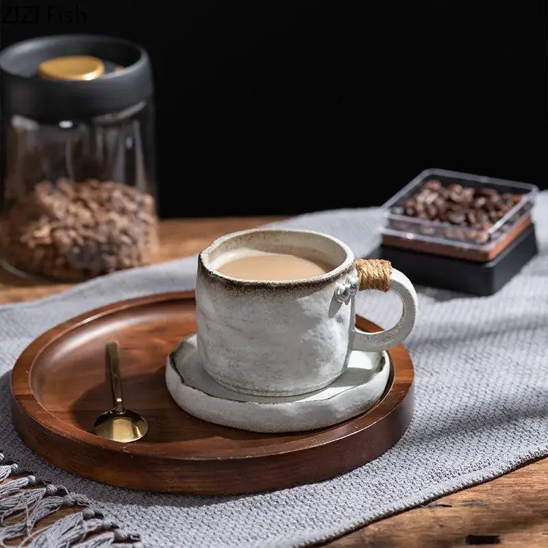 A rustic teal coarse pottery cup and saucer set featuring a white ceramic mug with twine-wrapped handle by decorbites coarse pottery