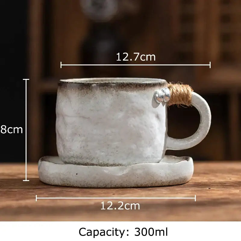 Rustic white ceramic coarse pottery cup and saucer with dark brown rim from decorbites coarse pottery dining collection