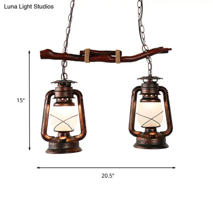 Rustic bronze 2-light lantern island pendant light with natural wood branch accent for dining room by decorbites