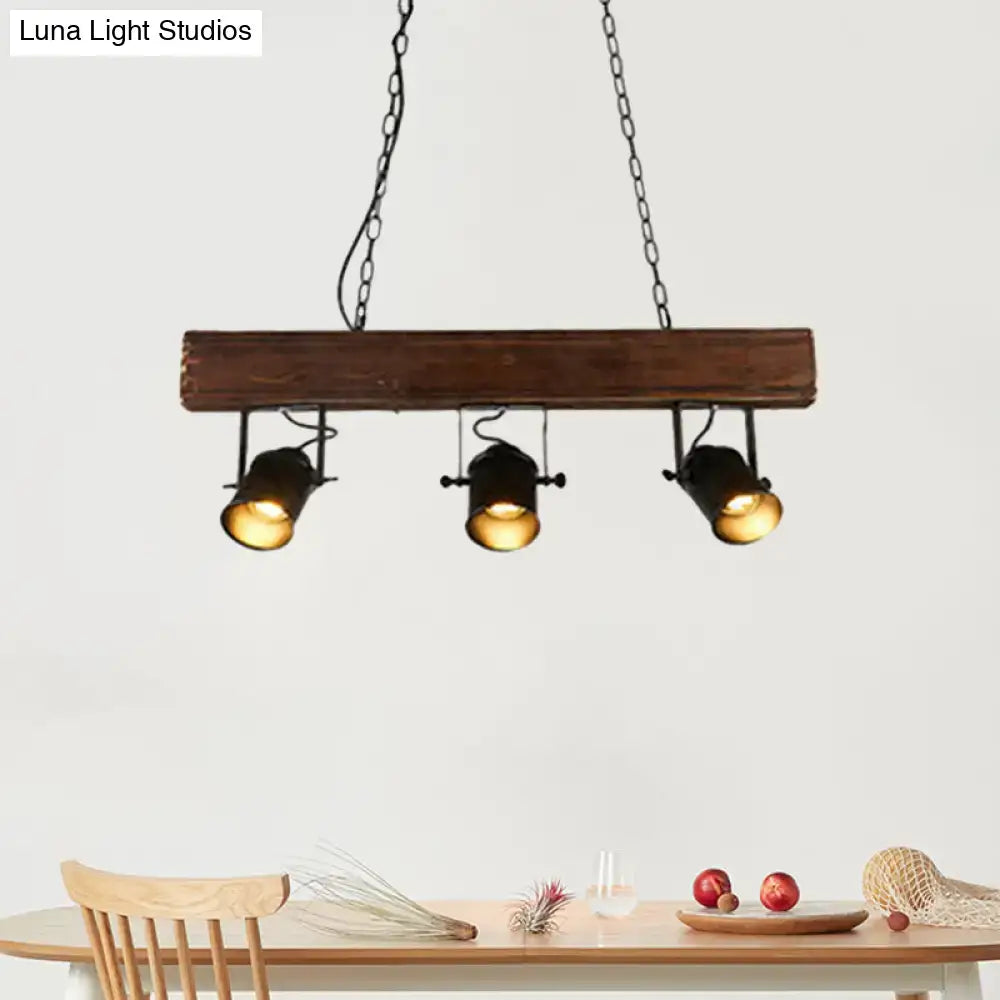 Decorbites vintage 3-headed metal pendant light with black barrel shades on rustic linear wooden beam for restaurant lighting