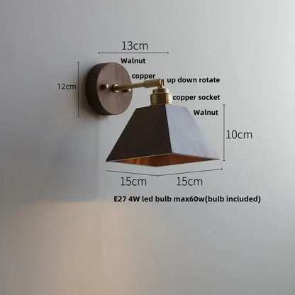 Rustic walnut and brass glass wall light fixture with walnut base copper arm and geometric black shade for bedroom use